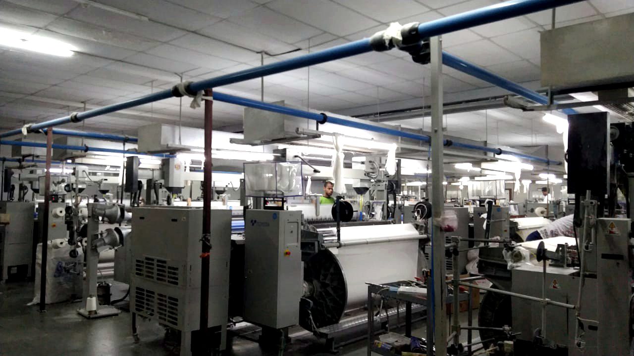 Water-Jet Loom in Motion